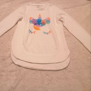 Unicorn fluffy long sleeve size 9/10 in kids the shirt is white